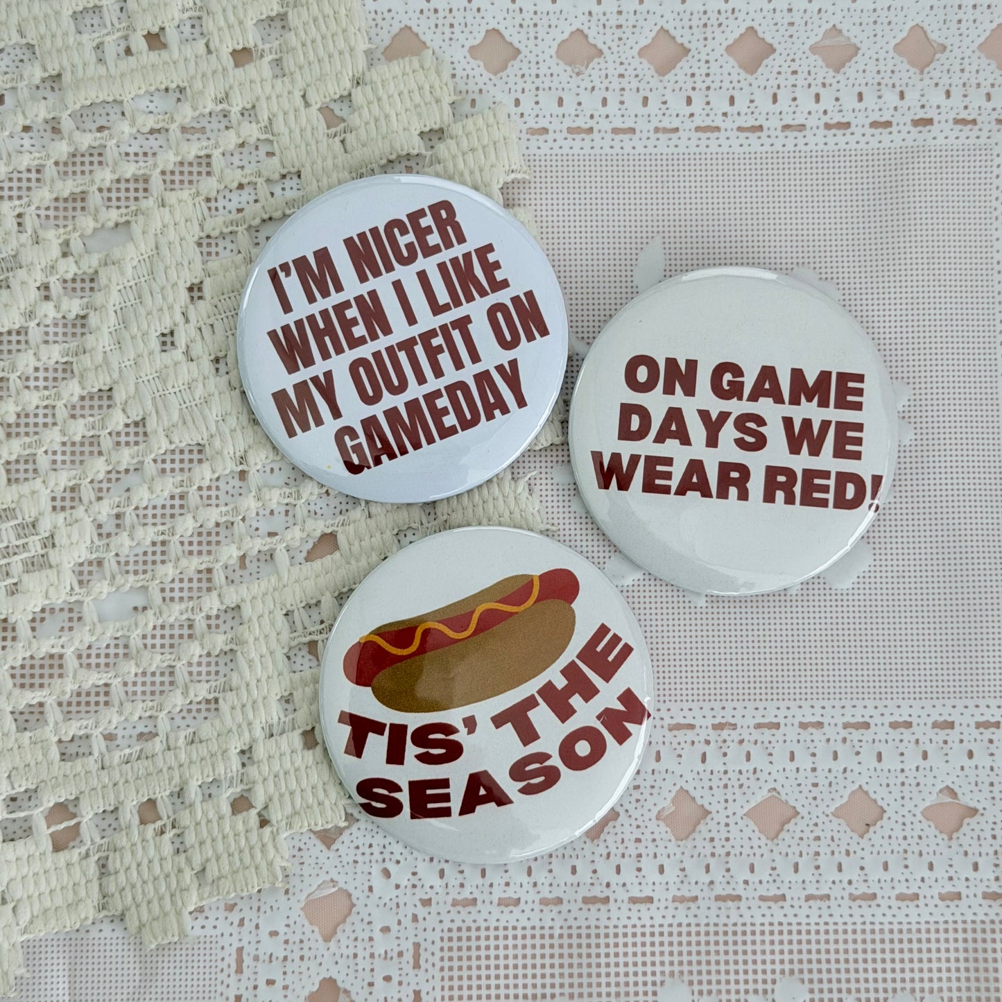 Nebraska Huskers button set with three red and white game day pinback buttons