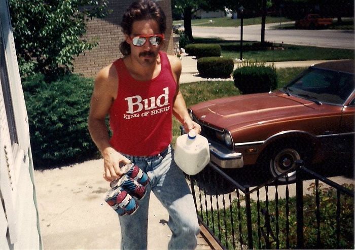 Man wears vintage Budweiser tank top