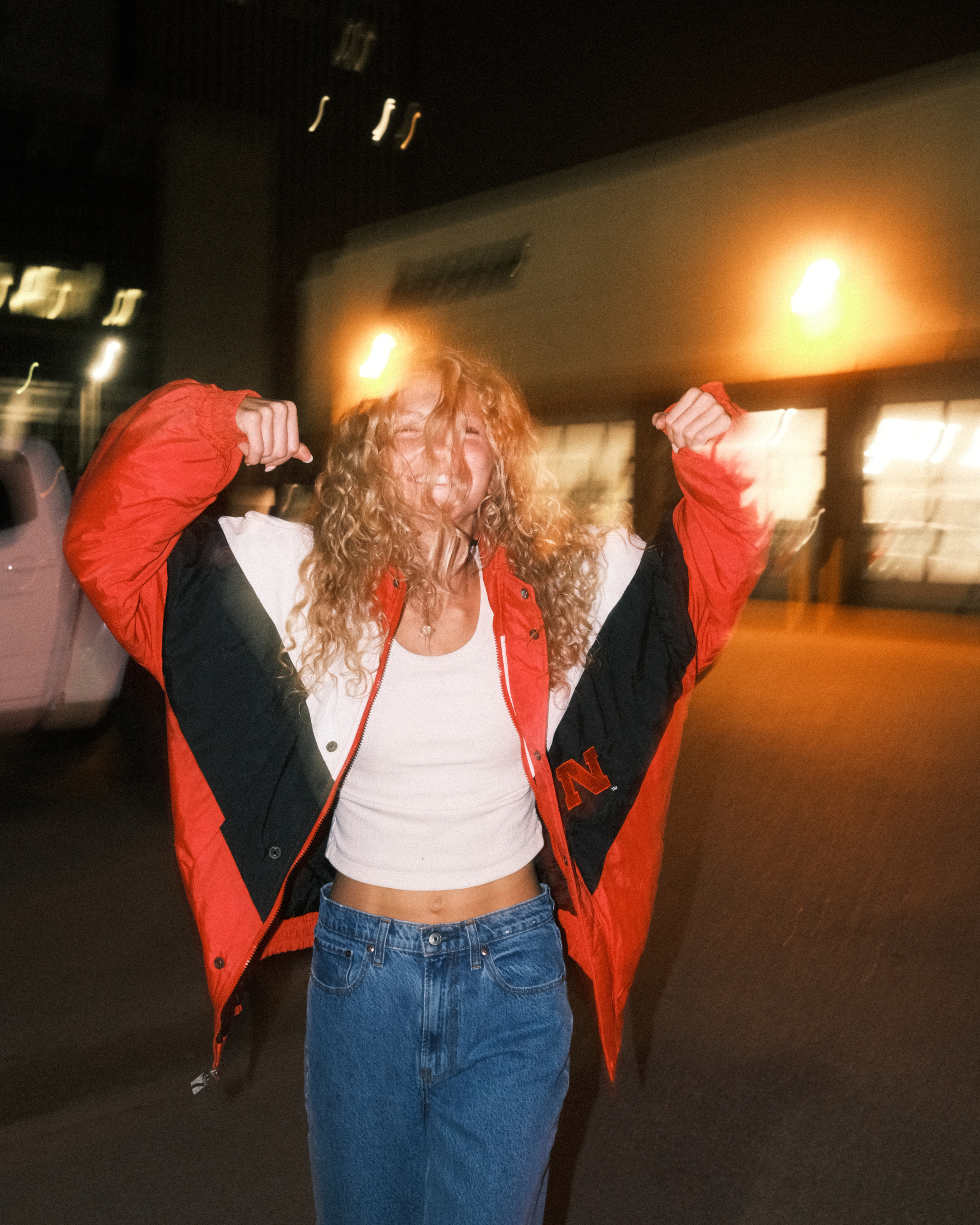 Women smiles in Nebraska Jacket