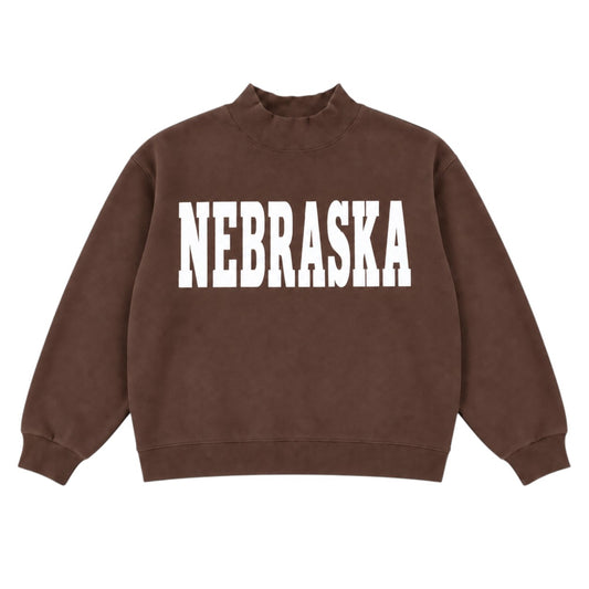 Brown Nebraska mockneck sweatshirt with bold white NEBRASKA lettering