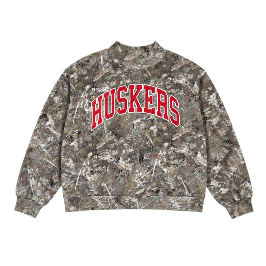 Camo Nebraska Huskers crewneck sweatshirt with red and white HUSKERS lettering