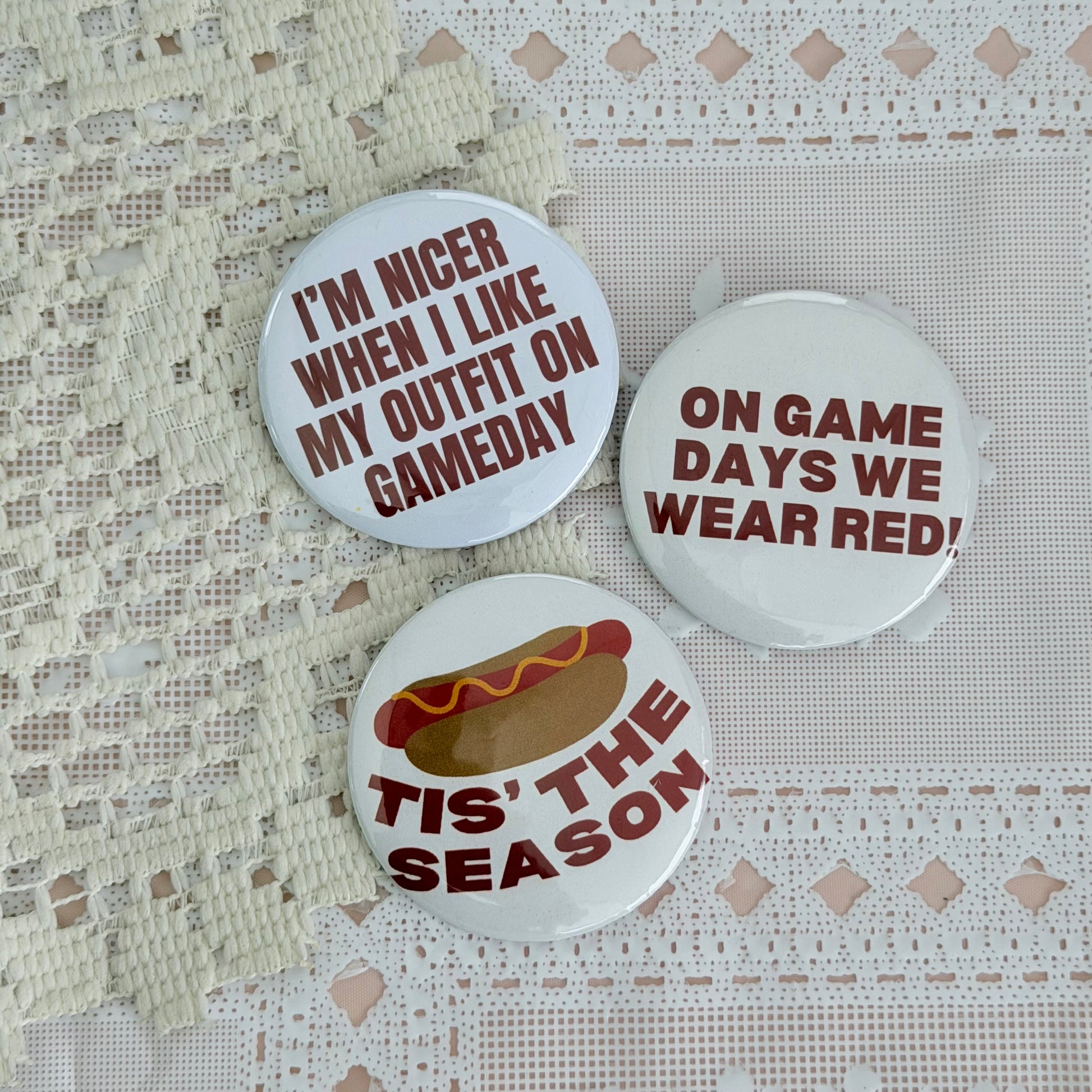 Nebraska Huskers button set with three red and white game day pinback buttons