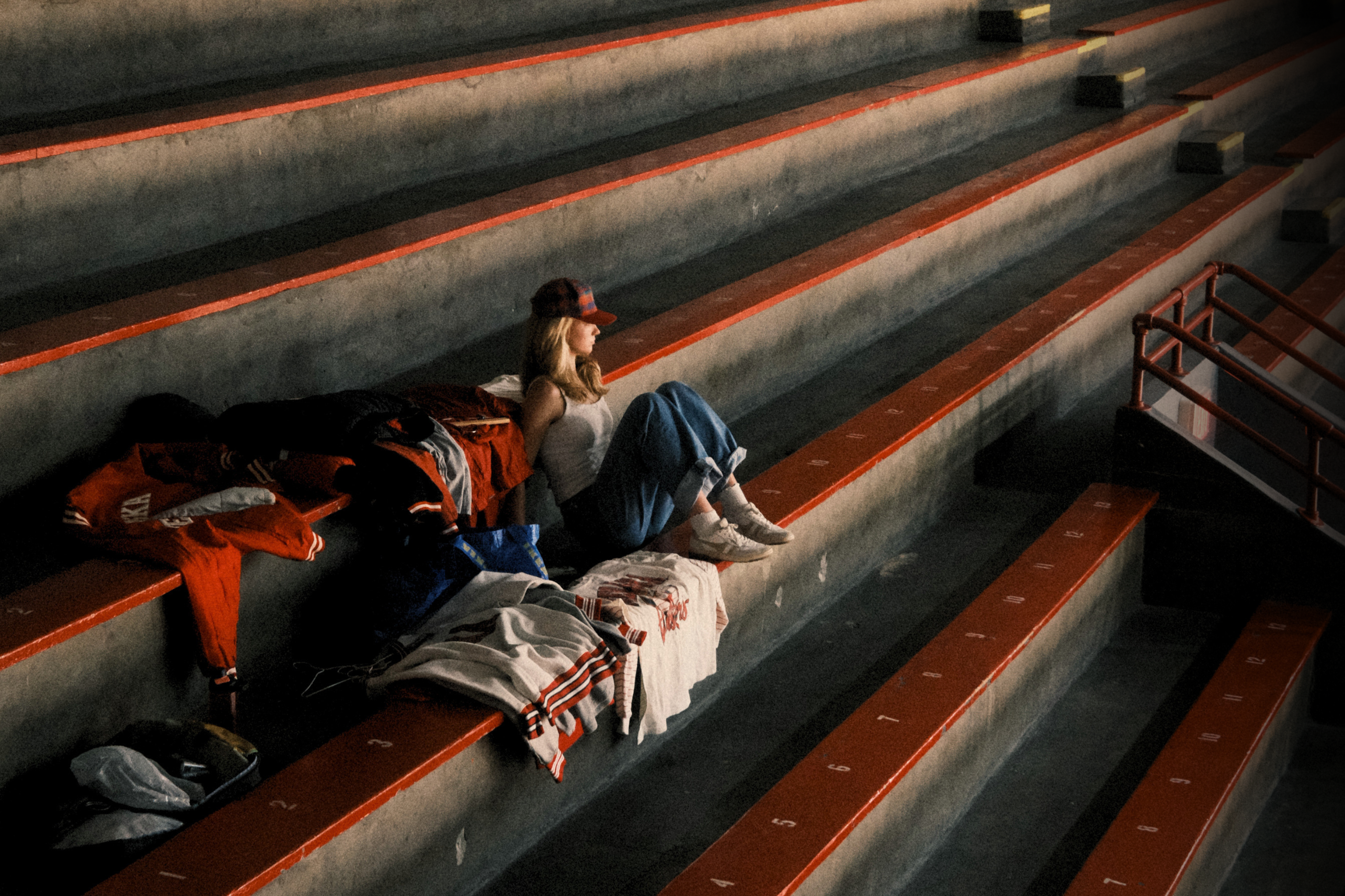 Vintage Nebraska Huskers clothing displayed on the bleachers at Memorial Stadium